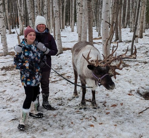 Posing with reindeer