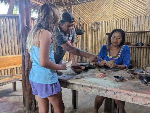 Adeline and Daisy making pots