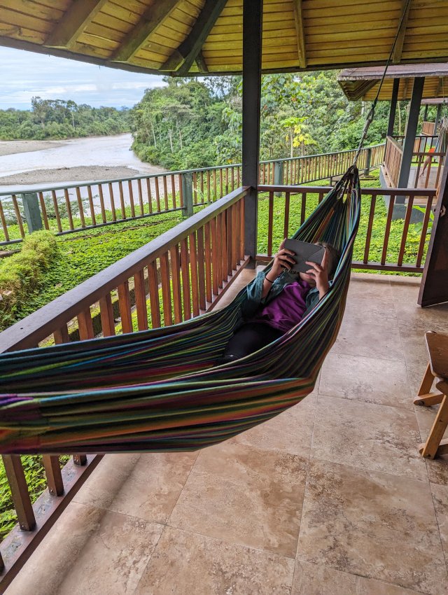 Adeline reading in the hammock