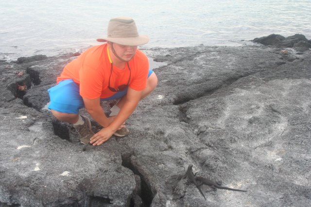 Carter with baby marine iguanas.jpg