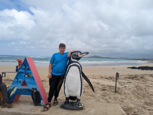 Posing with penguin