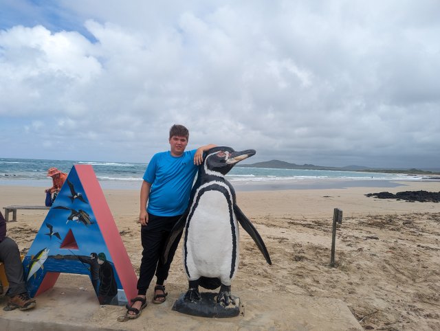 Posing with penguin